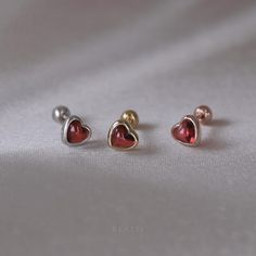 ◆ PRODUCT SPECIFICATION ◆ * Sold as Single Piece * Material : Heart Shaped Natural Garnet Cabochon, 14K Gold Vermeil (A heavy plating of 14K gold over Solid 925 sterling silver) * Jewel Head Size : 5mm(W) x 5mm(H) * Ball Screw (Back) Size : 3mm * Bar Gauge (thickness) : 20 gauge (0.80mm)  * Bar length : 6mm * Ball Screw Closure (Externally Threaded) ◆ JEWELRY CARE for GOLD PLATED 925 STERLING SILVER ◆ To keep your gold plated silver jewelry in good condition, we recommend following these additio Heart-shaped Piercings For Valentine's Day Gift, Heart Charm Piercings As Gift, Heart Charm Piercings For Gift, Heart-shaped Piercings With Heart Charm For Gift, Silver Heart Piercings For Valentine's Day, Heart-shaped Internally Threaded Earrings As Gift, Heart-shaped Internally Threaded Cartilage Earrings As Gift, Heart-shaped Cartilage Earrings For Gift, Heart-shaped Sterling Silver Piercings As Gift