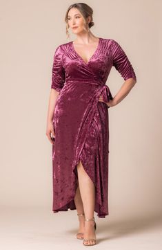 Shine through the upcoming party season in this elegant gown of shimmering crushed velvet in a choice of opulent jewel tones. Ruching along the yoke and sleeves adds a pretty touch to the flattering wrap style while the tulip-cut hem moves gracefully down the carpet. 62" length True-wrap style with side-tie closure Surplice V-neck Three-quarter sleeves Unlined 95% polyester, 5% spandex Dry clean Made in the USA of imported fabric Encore and Special Occasion Jumpsuit And Cardigan, Crushed Velvet Fabric, Chic Cardigan, Velvet Wrap Dress, Velvet Maxi Dress, Evening Gown Dresses, Gowns Of Elegance, Sugar Plum, Jumpsuit Fashion