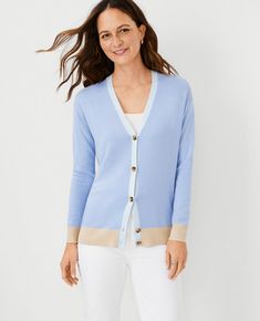 Our V-neck cardigan is an easy and effortless silhouette, smartly trimmed with contrast color. V-neck. Long sleeves. Button front. Drop shoulders. Ribbed cuffs and hem. Long Duster Cardigan, Grey Knit Cardigan, Pink Cardigan Sweater, Textured Cardigan, J Mclaughlin, Chunky Knit Cardigan, V Neck Cardigan, Cardigan Sweaters For Women, Dress With Cardigan