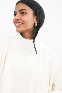 Made for maximum comfort + style, our Boerum Sweatshirt is handcrafted from breathable, mid-stretch European French Terry in a loose, asymmetric silhouette. She features a high neckline with an off-center metal zip (unzip and fold down to create a collar!), extra-long sleeves with thumbhole cuffs, and an oversized kangaroo pocket. Perfect to throw on and go, Boerum has a relaxed fit, but you can also size her up for extra slouchiness if desired—our models are both shown wearing size S, sizing up High Neck Sweatshirt, Extra Long Sleeves, Social Impact, The A Team, Long Sleeve Sweatshirt, Comfort Style, Oversized Sweatshirt, High Neckline, Comfortable Fashion