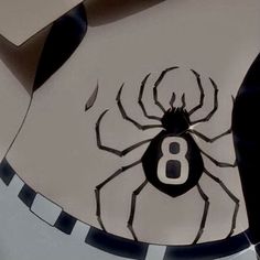 an animated spider with the number 8 on it's chest