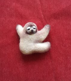 "Sloth Pin. Sloth brooch. Hanging Sloth. Felt brooch. Animal pin. Gift brooch. Sloth jewellery. Sweet Sloth. This adorable brooch is handmade with felting technique . It is cute, soft , lightweight and definitely eye catcher ! size 2,5\" (6,5 cm) Materials: The brooch is made from 100% wool, in a dry felting , pin to affix If you have any wish just contact me , I can make any animal that you want This can be any animal or your favorite pet. You just need to send me a photo of a pet. And I will m Novelty Brooch Jewelry Gift, Cute Handmade Brooches As Gifts, Cute Handmade Brooches For Gifts, Cute Handmade Pins As Gifts, Cute Handmade Pins For Gifts, Sloth Photos, Sloth Animal, Sloth Jewelry, Dry Felting