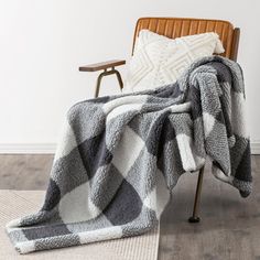 a chair with a blanket on top of it