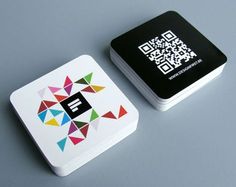 two square coasters with qr code printed on the front and back, one in black and white