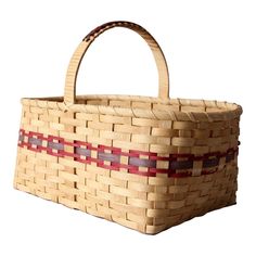 a woven basket with red and purple strips on the bottom, sitting against a white background