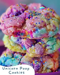 unicorn poop cookies stacked on top of each other