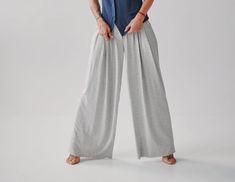 "Boho palazzo pants for women with high waist and pockets in a beautiful light grey color. You will love these wide leg palazzo pants made by us from premium quality viscose fabric. These unique palazzo pants will be a perfect option for everyday and bohemian styles. Wide, straight, palazzo pants. At the front, we made delicate ruffles, two spacious pockets and we finished them strictly so that each of you could adjust the length that is right for you. >> REMEMBER! All products in my store are i High-waisted Wide Leg Yoga Pants With Pockets, Wide Leg Harem Pants For Loungewear, Baggy Full-length Wide Leg Pants For Loungewear, Relaxed Fit Wide Leg Harem Pants For Loungewear, Loosely Fitted Wide-leg Harem Pants For Loungewear, Versatile Wide Leg Summer Yoga Pants, Versatile Wide-leg Yoga Pants For Summer, Versatile Wide Leg Yoga Pants For Summer, Versatile Wide Leg Harem Pants With Relaxed Fit