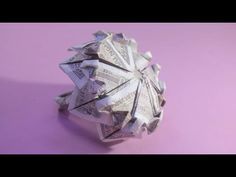 an origami ring made out of money