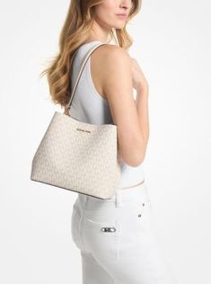 From its bucket-inspired shape to its Signature finish, the Pratt is a handbag that will stand the test of time. A coated canvas exterior promises lasting wear, while on the inside, a spacious interior with a median zip pocket ensures easy organizing. Slip the long, slender straps over your shoulder for hands-free wear. Bucket Hobo Bag With Zipper For Shopping, White Bucket Bag With Zipper For Shopping, Spring Shoulder Bucket Bag With Zipper, Spring Bucket Shoulder Bag With Zipper, Coated Canvas Bucket Shoulder Bag For Daily Use, Coated Canvas Bucket Bag For Errands, Coated Canvas Double Handle Bucket Bag, White Coated Canvas Shoulder Bag With Zipper, Spring Coated Canvas Shoulder Bag With Adjustable Strap