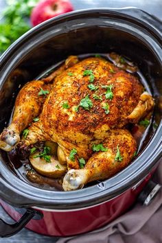 a close up of a chicken in a crock pot