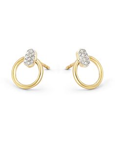 Our iconic oval shape, a classic silhouette, and a dusting of diamonds come together to create the Tegan 14k Yellow Gold Mini Hoop Earrings in White Diamond, designed to be loved for a lifetime. 

 We have taken steps to ensure that, when applicable, our diamonds are conflict free by requiring our suppliers to comply with the Kimberley Process. Oval Diamond Earrings With 14k Gold Accents, Oval 14k Gold Diamond Earrings With Accents, Oval Diamond Earrings With Pave Setting For Anniversary, Oval Diamond Earrings With Pave Setting As Gift, Fine Jewelry Earrings, Yellow Gold Stud Earrings, White Gold Earrings Studs, White Gold Studs, Kendra Scott Earrings