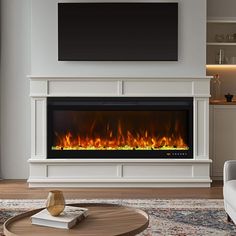 a living room with a fireplace and tv on the wall