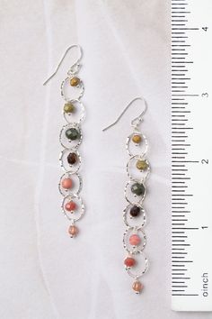 The Promise Collection offers a captivating colorway. These unique dangle earrings are handcrafted and finished with sterling silver ear wires for a polished look. Sterling Silver (Lead & Nickel Free) Czech Glass, Crystal 2.75" with sterling silver ear wires We hand select our natural materials, thus there may be slight variations in color and/or size that will not detract from the overall aesthetic. Our unique handcrafted designer jewelry for women is made in America, each design created indivi Hypoallergenic Multicolor Sterling Silver Earrings, Hypoallergenic Sterling Silver Chandelier Drop Earrings, Adjustable Sterling Silver Dangle Chandelier Earrings, Adjustable Sterling Silver Chandelier Dangle Earrings, Multicolor Hypoallergenic Sterling Silver Jewelry, Hypoallergenic Multicolor Sterling Silver Jewelry, Artisan Sterling Silver Chandelier Earrings Nickel Free, Artisan Sterling Silver Nickel-free Chandelier Earrings, Multicolor Sterling Silver Ear Wire Jewelry