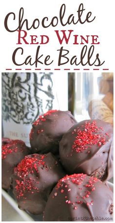 chocolate red wine cake balls with sprinkles in the middle on a plate