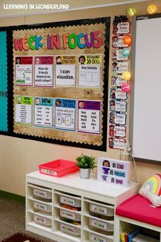 a bulletin board in the corner of a classroom