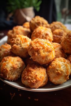 a white plate topped with cheesy biscuits