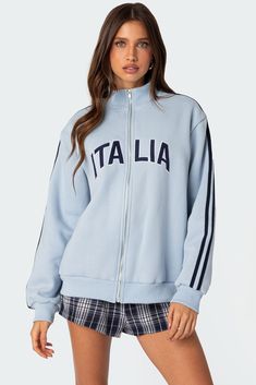 Jacket Zip front closure Embroidered text Striped sleeves Polyester Model wears size S Model height is 5'7 Item care: Wash with similar color Cropped Faux Leather Jacket, Visionary Fashion, Swimwear Dress, Striped Sleeve, Faux Leather Jackets, Track Jacket, Sporty Style, Zip Sweatshirt, Track Jackets