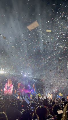 confetti is thrown in the air at a concert