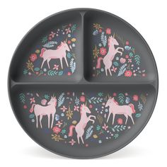 the unicorns are painted on the side of this divided plate, which is decorated with flowers