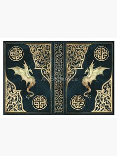 an intricately designed book cover with a dragon on it's front and sides