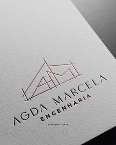 the logo for agda marcla engenharia is shown on a piece of paper