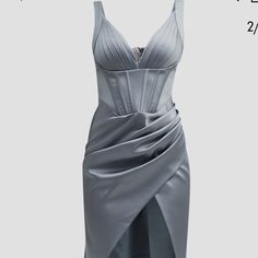 “Scarlet” Draped Sleeveless Corset Midi Dress Pleated Cups And A Corset Body Deep V Neckline Sleeveless High-Low Hem Hem Hits Around The Knee Bodycon Silhouette Elegant Gray Ruched Dress, Gray Sleeveless Gala Dress, Fitted Gray Sleeveless Knee-length Dress, Elegant Gray Dress With Spaghetti Straps, Fitted Gray Evening Dress, Elegant Gray Spaghetti Strap Dress, Fitted Gray Dress For Gala, Fitted Sleeveless Gray Midi Dress, Fitted Gray Sleeveless Midi Dress