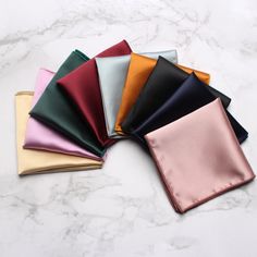 Make your wedding outfit look even more stylish with our beautiful collection of Satin pocket squares. They are made from high-quality Satin and it feel so soft. You can choose the one that matches your wedding theme and suits your style. These pocket squares are easy to use and add a touch of elegance to your wedding look. Just fold them and put it on your suit jacket pocket, and you're ready to go. They are durable and won't get wrinkled even if you move around a lot during the wedding. The sa Gentleman Mode, Gentleman Fashion, Wine Rose, Pocket Square Styles, Vintage Gentleman, Champagne Pink, Wedding Handkerchief, Wedding Groomsmen, Silk Pocket Square