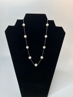 "Here we have a lovely station necklace made from silver and pearls. Standard spring-ring clasp is marked, \"925 IPS\".  925 means that the box chain is made from 925 Sterling Silver. IPS means \"Imperial Pearl Syndicate\" which is a very fine pearl jeweler. The chain is super fine and delicate. Pearls are very nicely shaped - round and consistent. Total of nine (9) pearls are staggered on the silver chain.  Original purchase price was $300.00.  Dimensions: Length: 42cm Diameter (pearls): 1cm Co White Gold Sterling Silver Single Strand Pearl Necklace, White Gold Single Strand Pearl Necklace In Sterling Silver, Classic Sterling Silver Single Strand Pearl Necklace, Classic Single Strand Sterling Silver Pearl Necklace, Formal Single Strand Sterling Silver Pearl Necklace, Classic Silver Jewelry With Pearl Chain, Anniversary Pearl Necklace With Sterling Silver Clasp, Pearl Jewelry With Silver Chain As A Gift, Formal Silver Pearl Necklace With Sterling Silver Clasp