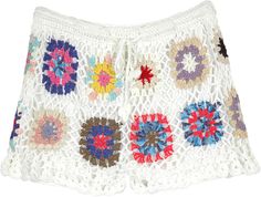 These peppy bohemian crochet shorts in snow white with multicolored flowers are the summer essential you have been looking for. They are very soft and comes with polyester lining. #tlb #CrochetClothing #vacationclothing #beachwrap #Floral #bohemianfashion #WhiteShorts #ColorfulShorts Multicolored Flowers, Bohemian Crochet, Beach Floral, Hippie Look, Crochet Shorts, Beach Wrap, Trendy Skirts, Crochet Clothing, Summer Essential