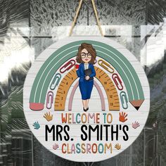 a welcome sign hanging from the side of a glass door that says, welcome to mrs smith's classroom