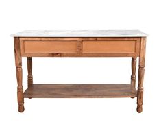 an old wooden table with two drawers and marble top