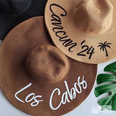 This listing is for one custom floppy hat with your choice of hat color, text color, and phrase. The hat is also available without personalization/text. No props are included. PRODUCT DETAILS: - Paper/straw floppy hat with iron on glitter vinyl (not embroidered) - One size fits most; includes an elastic strap for securing the hat - Hat measures 18 inches across, 7.5 inch crown/hat opening; 5.25 inch brim (wired brim) - Text size may slightly vary depending on the provided number HOW TO ORDER: 1) Select a text color*. Select NO TEXT ON HAT for a hat with no text/personalization. 2) Select a hat color*. 3) For personalized hats, provide your custom text. Keep this under 20 characters including spaces; no special characters/emojis/graphics. Do not use caps lock; caps lock text may be changed Fun Curved Brim Hats For Vacation, Summer Bucket Hat With Letter Print, Vacation Sun Hat With Letter Print And Curved Brim, Summer Beach Hat With Letter Print, Summer Beach Hats With Letter Print, Summer Hat With Letter Print And Curved Brim, Summer Hats With Letter Print For Beach, Adjustable Beach Hats With Letter Print, Beach Hat With Letter Print And Flat Brim