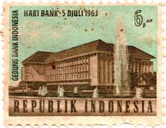 a stamp with an image of a building and fountain in front of the words republik indonesia