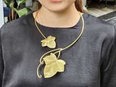 Gold Necklace - Brass Necklace - Statement Necklace - handmade jewelry This is such a fabulous gold brass necklace! it is carved by hand with the Maple Leaf.  The necklace is bendable, please bend the product along your collarbone to adjust the necklace to be fit to your neck! ►Handcrafted from 100% pure brass by Vietnam skilled craftsman. Perfect item for outfit everyday, brass collection or photography. These necklace are perfect for impressive outfit or can be a special gift for friends, fami Hand Forged Gold Brass Necklaces, Gold Brass Necklaces With Unique Variations, Handmade Gold Brass Necklace, Gold Pendant Necklace With Unique Design, Unique Design Gold Pendant Jewelry, Handmade Gold Pendant Choker, Hand Forged Gold Necklace For Gift, Gold Necklace Unique, Maple Leaf Necklace