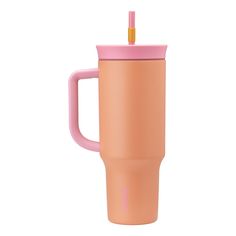 a pink coffee cup with a straw sticking out of it's lid and handle