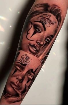 a man's arm with tattoos on his face and two faces in the middle