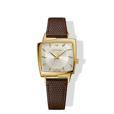 This gold tone watch features an asymmetrical design inspired by the 1950's and 1960s. The original Accutron "521" was worn by some of the most influential musicians of the time. Featuring a Swiss movement, silver dial with index markers, fixed to a brown leather strap. Powered by a Swiss Made Sellita watch movement. Modern Brown Watch Accessories With Polished Finish, Timeless Brown Watches With Polished Finish, Brown Leather Watch With Polished Finish, Gold Retro Watch With Polished Finish, Gold Watch Brown Leather Strap, Watch With Leather Strap, Brown Leather Strap, Asymmetrical Design, Watch Movement