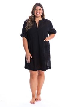 Plus Size Resort Wear Cover up around the resort in style with our soft, lightweight, plus size cotton over shirt. Wear the sleeves long for sun protection or roll them up and secure with the tab and button for a stylish look you can wear on and off the beach. Stylish black is always a classic option to wear with any swimsuit. Great Side Pockets Roll Up Sleeves with Button Detail Fabric: 100% Cotton Red head model wears size M Overshirt Measurements in Centimetres Small Medium Large XL XXL Bust Casual Tops With Upf 50+ For Beach, Relaxed Fit Long Sleeve Cover-up For Vacation, Casual Loungewear Cover-up With Upf 50+, Casual Black Cover-up For Beach, Casual Black Beach Cover-up, Casual Tunic Cover-up For Beach Season, Casual 3/4 Sleeve Beach Tops, Casual Upf 50+ Cover-up For The Beach, Casual Upf 50+ Beach Cover-up