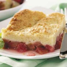 a piece of pie on a plate with strawberries