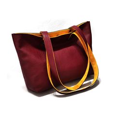 Genuine Italian leather bag, comfortable and stylish! It's perfect for carrying by day and it's generously proportioned to stow all daily essentials. It's a tote bag for women made of the highest quality Italian leather, perfect to contain your laptop, books, shopping, essentials, and whatever else you may need to toss in! 2 Color Variants available: Burgundy / Yellow Gray / Yellow MEDIUM size bag: Top Width: 15.7 inches / 40 cm Bottom Width 12.2 inches / 31 cm Height: 10.2 inches / 26 cm Depth: 3.93 inches / 10 cm Strap drop: 12.6 inches / 32 cm LARGE size bag: Top Width: 18 inches / 46 cm Bottom Width 13.4 inches / 34 cm Height: 11 inches / 28 cm Depth: 5.9 inches / 15 cm Strap drop: 12.6 inches / 32 cm 2 large internal pockets 1 practical internal key ring hook Removable internal rigid Burgundy Tote Bag For Travel, Burgundy Tote Bags For On-the-go, Large Capacity Burgundy Shoulder Bag For Travel, Red Laptop Bag For Everyday Use, Large Capacity Laptop Bag For Daily Use, Burgundy Shoulder Bag With Large Capacity For Daily Use, Soft Leather Tote Laptop Bag For Daily Use, Burgundy Tote Shoulder Bag For Travel, Soft Leather Laptop Tote Bag For Daily Use