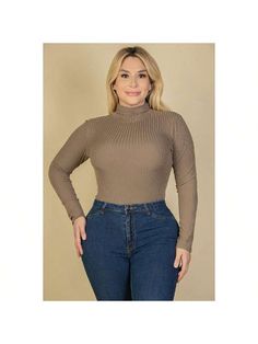 Elevate your wardrobe with our Plus Size Ribbed Turtle Neck Long Sleeve Bodysuit. Crafted from soft and lightweight, high-stretch rib knit fabric, this bodysuit offers both comfort and style for various occasions.Key Features:- Fabric: Soft and lightweight high-stretch rib knit
- Fit: Plus size bodysuit with a turtle neck and long sleeves for a chic look
- Color Options: Available in classic black, navy blue, and burgundy
- Sizes: Available in sizes 1X to 3X
- Design: Features a flattering ribbe Winter Long Sleeve Solid Color Bodysuit, Winter Ribbed Turtleneck Bodysuit, Winter Turtleneck Solid Bodysuit, Casual Brown Long Sleeve Bodysuit, Fitted Brown Long Sleeve Bodysuit, Beige Party, Plus Size Bodysuit, Turtle Neck Long Sleeve, Blue And Burgundy