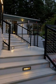 some white stairs with lights on them