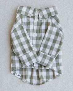 The Sylvan Moss Gingham Button-up Dog Shirt meets style with substance, for a pup with purpose. Allover moss green gingham print covers a soft cotton collared shirt, while smooth white functional buttons adorn a proper placket. Cute cuffs match an even cuter collar, telling the world (or at least the entire dog park), "I mean business, but I'm adorable." Fall Gingham Cotton Shirt, Up Dog, Green Gingham, Out Of The Woods, Gingham Pattern, Gingham Print, Dog Park, Collared Shirt, Moss Green