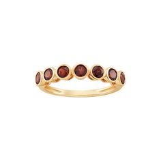 Wear it alone or stack it up with your favorite pieces! Crafted in 10K yellow gold, this ring features round-cut natural garnet stones that are set halfway across the band. This January birthstone ring is versatile enough to pair with any outfit or jewelry in your wardrobe. Size: 8.  Gender: female.  Age Group: adult. January Birthstone Rings, January Birthstone, Garnet Stone, Birthstone Ring, Band Ring, Women Rings, Round Cut, Band Rings, Gender Female