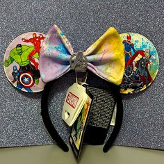 Nwt- Loungefly Disney Avengers Artist Series Minnie Ears. Avengers Logo Is Prominently Featured In The Center. Bow Is Removable. Ears Feature The Artwork Of Sara Pichelli. One Ear Features Hulk, Captain America, And Iron Man, While The Other Showcases Captain Marvel, Thor, And Black Panther. Captain America And Iron Man, Sara Pichelli, Avengers Logo, Marvel Thor, Loungefly Disney, Minnie Ears, Disney Accessories, Captain Marvel, Black Panther