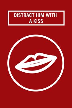 a red and white sign with the words,'district him with a kiss '