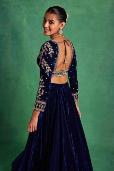 Blue blouse featuring embroidered floral jaal motifs highlighted by sequins, pearls and crystal embellishments. Comes with solid flared lehenga and floral butti embroidered dupatta. - Aza Fashions Velvet Indian Outfits Wedding Dresses, V Neck Choli Designs, Welwet Blouse Designs Latest, Blue Velvet Blouse Designs, Velvet Lehnga Ideas, Velvet Dupatta Lehenga, V Neck Blouse Indian Lehenga, Lahanga Blouse Design Latest, Velvet Choli Designs Lehenga