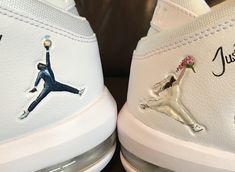 two air jordan shoes decorated with flowers and the word just married on one pair of sneakers