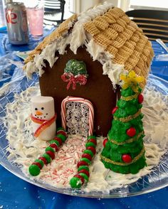 a gingerbread house decorated with christmas decorations