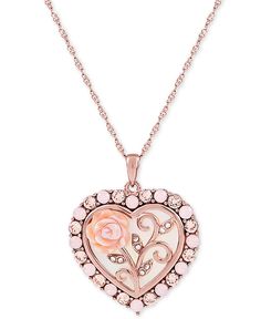 Vintage-inspired in its elegant detail, this cameo necklace features a heart-shaped with mother of pearl (16mm) pendant depicting a flowering rose. Cubic zirconia details provide a sparkling finish. Rose-colored Round Jewelry For Valentine's Day, Rose Colored Round Jewelry For Valentine's Day, Round Rose Jewelry For Valentine's Day, Rose Gold Jewelry With Roses For Formal Occasions, Rose Gold Jewelry With Roses For Mother's Day, Valentine's Day Rose Gold Necklaces With Rose Design, Rose Gold Necklaces With Rose Design For Anniversary, Pink Rose Design Jewelry For Valentine's Day, Feminine Rose Jewelry For Valentine's Day